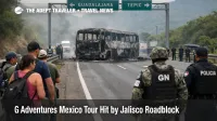 G Adventures Mexico tour disruption, traffic halted on a Jalisco highway corridor between Puerto Vallarta and Guadalajara