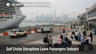 Gulf cruise disruption scene at Dubai port, ship held alongside as passengers wait under security restrictions