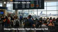 O'Hare summer flight cap scene at ORD shows busy gates and a departures board with delays during peak travel