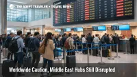 Worldwide Caution security alert scene, travelers wait at Dubai International as Middle East airspace closures disrupt flights