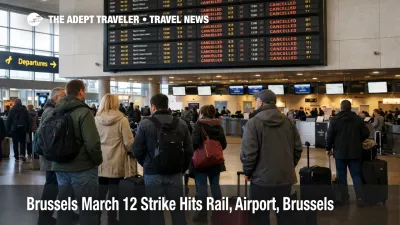 Passengers watch cancellations at Brussels Airport during the Brussels March 12 strike, with rail disruptions nearby