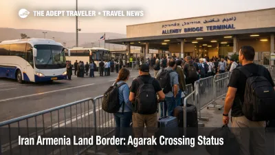 Iran Armenia land border crossing scene at Agarak with travelers queued at control booths under overcast skies