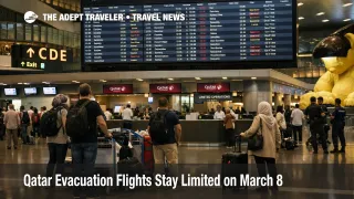 Qatar evacuation flights at Hamad airport show travelers waiting under limited departure boards in Doha