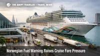Norwegian cruise fuel warning shown by a ship at PortMiami, with active terminal operations and travelers boarding