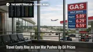 Airport terminal and nearby gas price sign illustrate rising travel costs for U.S. travelers in March 2026