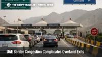 UAE border congestion at Hatta shows slow outbound lanes and checkpoint queues on an overland exit route