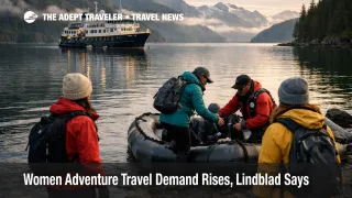 Women adventure travel scene with an expedition ship and guided Alaska shore landing for small-group explorers