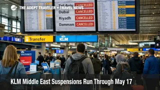 KLM Middle East suspensions shown on Schiphol departure boards as travelers wait for disrupted flights to Tel Aviv and Dubai