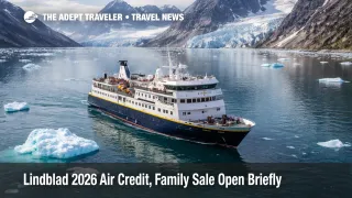 Lindblad 2026 air credit offer shown through an expedition ship sailing icy waters off Southeast Greenland