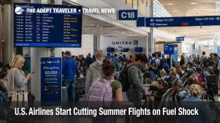 Crowded Chicago O'Hare gate area shows U.S. summer flight cuts reducing backup options as fuel costs surge.