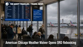 Travelers at ORD watch delay boards during the American Chicago weather waiver for severe storms.