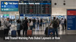 UAE transit warning scene at Dubai International Airport with travelers checking layover flight boards.