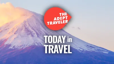 A view of Mount Fuji during the morning, Today in Travel and The Adept Traveler logo overlay the image.